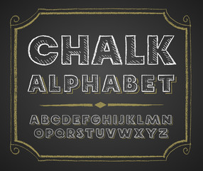 Hand drawn alphabet on chalkboard
