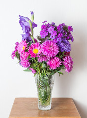Naklejka na ściany i meble Colorful flower bouquet arrangement in vase