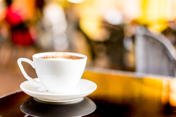 Coffee cup on table ,mocca ,soft focus