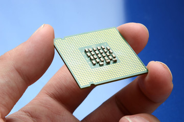 micro processor chip in hand