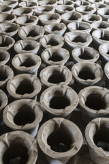 Obraz premium Rows of clay pots in artisan yard in a village near Battambang, Cambodia