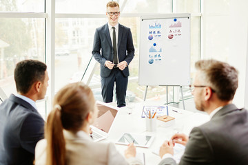 Businessman by whiteboard