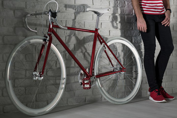 Fototapeta na wymiar This is very trendy, red fixie bike