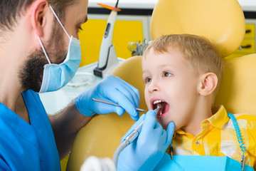 small kid, patient visiting specialist in dental clinic