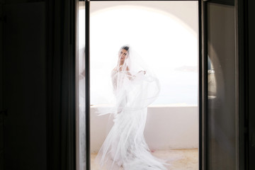 Beautiful luxury bride on the balcony