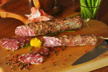 Homemade Italian salami on the wooden board