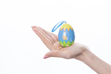 decorative Easter egg in female hand