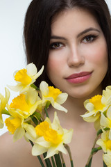 beautiful  woman with daffodils