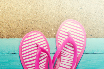 Fototapeta premium Summer concept with sandy beach, shells and cord.