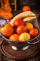 A selection of various fresh yellow raw organic produce fruits and vegetables