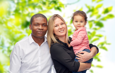 happy multiracial family with little child