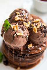Stack of Homemade Chocolate Pancakes with Chocolate Ice-Cream