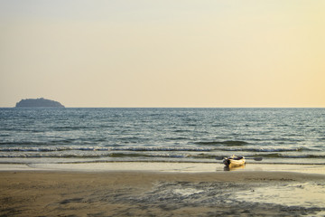 kayak (small boat) on evening beach, Thailand