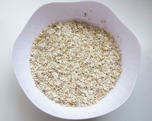 dry oat cereal in a bowl