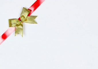 gold bow isolated on white with copy space