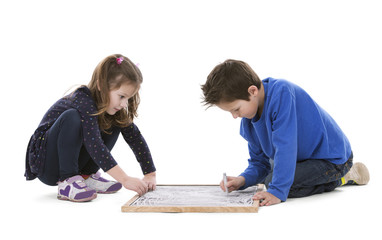 Fototapeta na wymiar children drawing on chalk board
