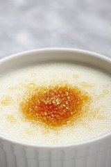 Ramekin filled by wheat semolina (farina) with milk and brown ca