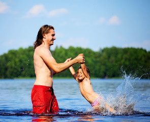 Father play with daughter