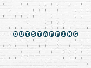 Finance concept: Outstaffing on wall background