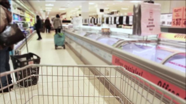 Grocery Store Cart Tour In Supermarket Time Lapse. Time Lapse of a supermarket cart with people doing shopping.