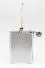 Liquor coming out of a liquor flask, non gravity