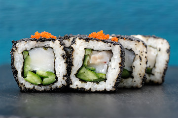 Set of square sushi rolls with white fish, vegs, cream cheese