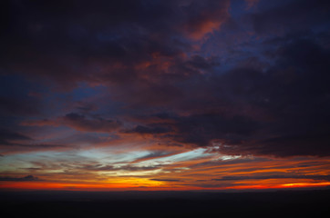 dark cloud and red sky before sunset