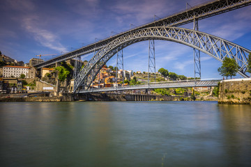 Fototapeta na wymiar City of Porto in Portugal. Ponte Luiz I Bridge over Douro river