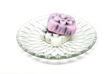 Snow Lotus cakes on a glass plate