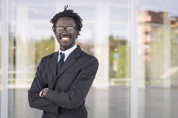 Portrait of a handsome black businessman  - obrazy, fototapety, plakaty