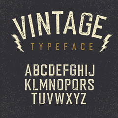 Vintage retro typeface. Stamped alphabet, white scratched letter - 108473735
