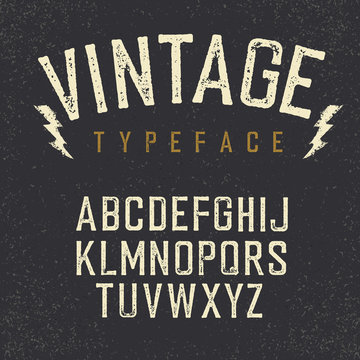 Vintage retro typeface. Stamped alphabet, white scratched letter