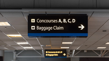 Airport directional signage on ceiling