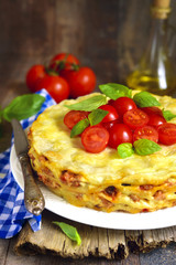 Lasagna pie with chicken and dried mushrooms.