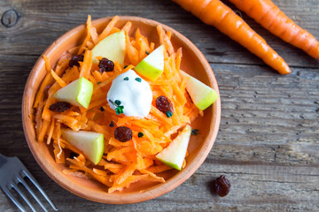 Carrot and apple salad with raisins