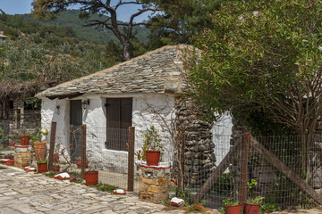 Fototapeta na wymiar Old stone house in village of Aliki,Thassos island, East Macedonia and Thrace, Greece 