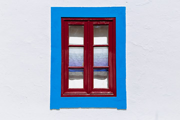 Fototapeta premium Detail of colorful window in Mertola, Portugal. Colors of Portugal Series