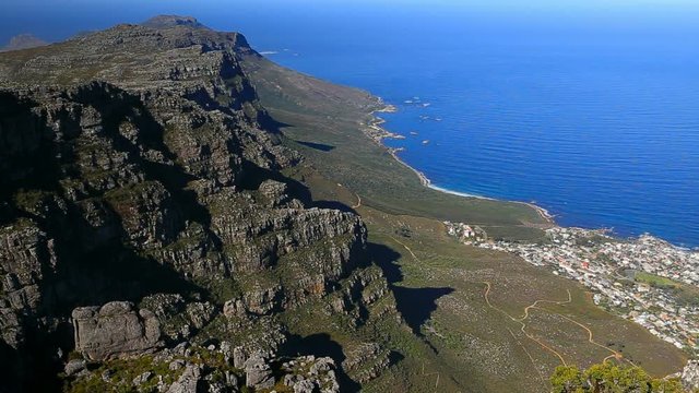 Republic of South Africa. Cape Town (Kaapstad). Table Mountain's western slopes, Camps Bay and the Atlantic coast - spectacular view from the top of Table Mountain