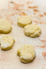Homemade donuts dough on the table