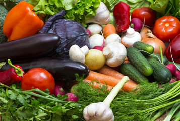Background of fresh vegetables and greens closeup