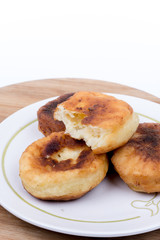 Homemade donuts with copy space over white background