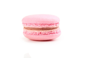 Tasty pink macaron isolated on white
