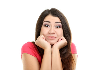 Fototapeta premium Portrait of a young girl on a white background