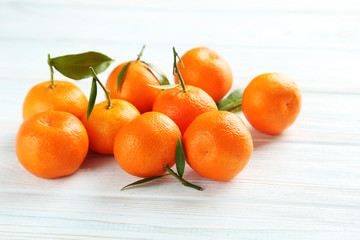 Ripe mandarin on a blue wooden table