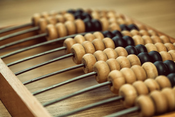 Vintage wooden abacus on the table