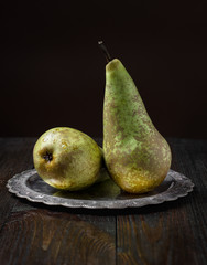Two pears on a vintage plate