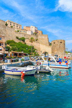 Typical old fishing boats in Calvi port on sunny summer day, Corsica island, France