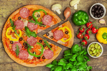 Tasty pizza with salami and paprika
