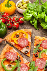 Tasty pizza with salami and paprika