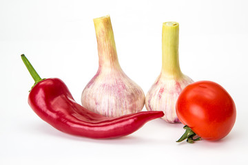 pepper paprika onion and garlic on a white background